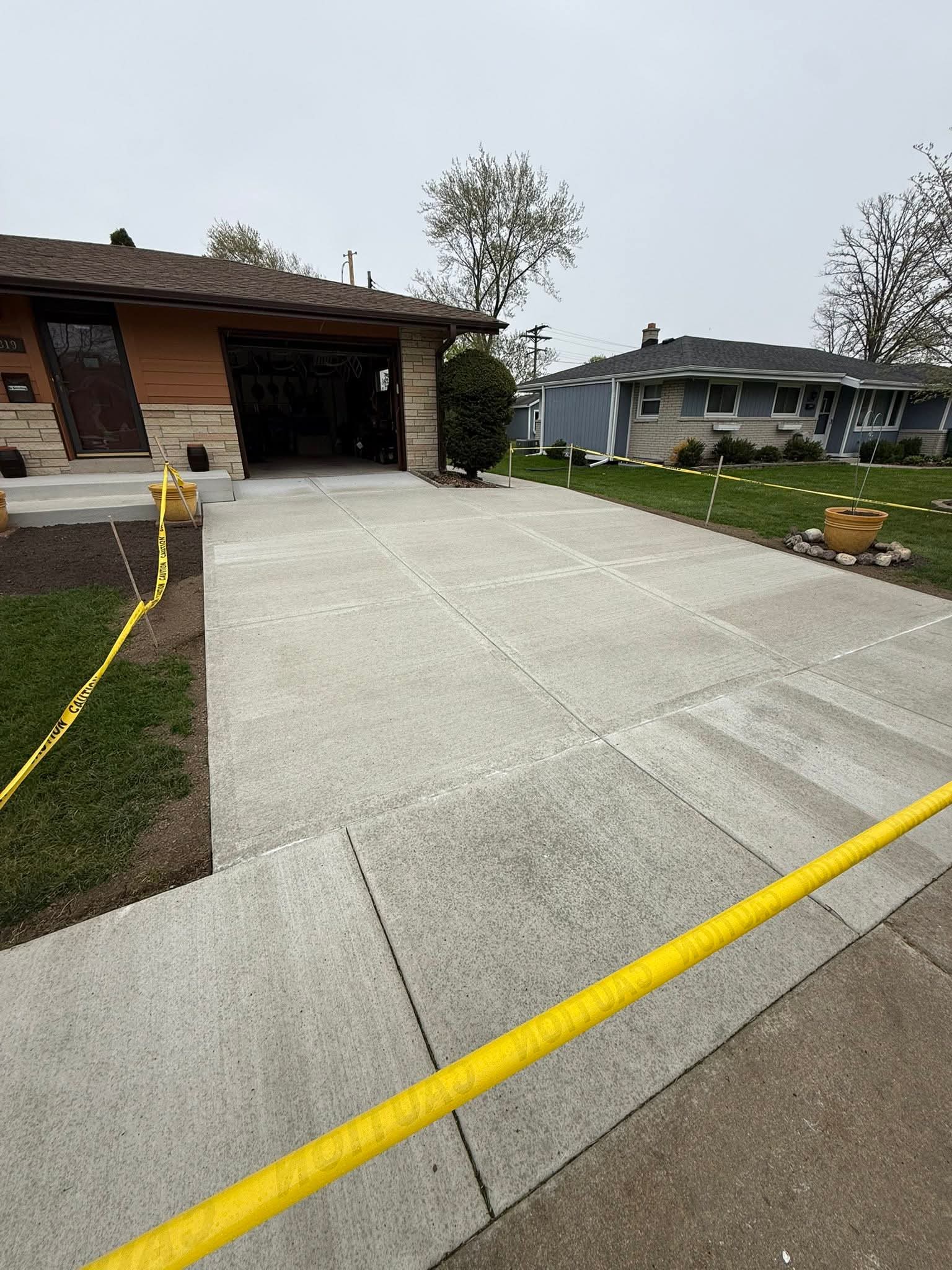 Concrete parking and driveway surface